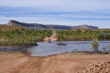 Pentecost river crossing with the orange cliffs of the Cockburn Range in the Kimberleys, Western...