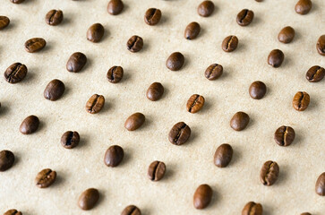 oblique lines of coffee beans lying on different sides. grains background