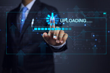 Businessman touch to upload data via virtual screen such as digital document data, website data or...