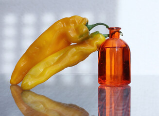 Two peppers and glass bottle - 621483013