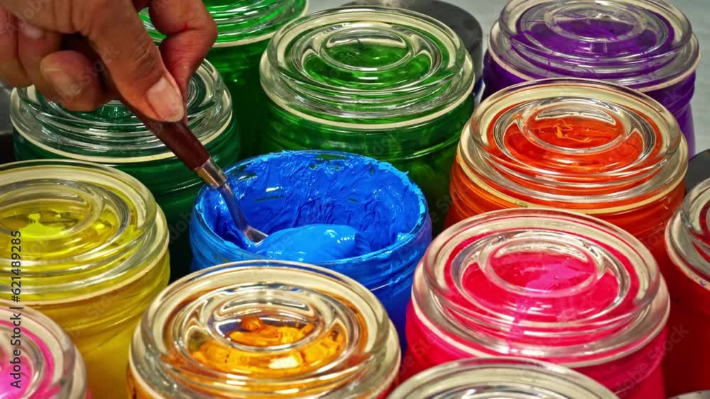 Aufkleber stirring blue color.use a trowel to stir the mass in a clear glass bottle..the subtle hues swirled t