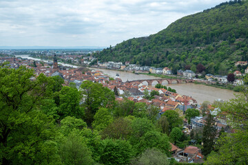 Fototapeta na wymiar Germany, aerial view of Heidelberg traditional city next to Neckar river and Old Bridge.