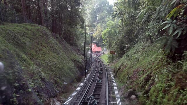 Ride on Cable Car Road on Penang Hill, Georgetown, Malaysia. View from Inside
