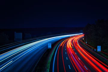 Foto auf Acrylglas Langzeitbelichtung - Autobahn - Strasse - Traffic - Travel - Background - Line - Ecology - Highway - Long Exposure - Motorway - Night Traffic - Light Trails - High quality photo  © Enrico Obergefäll