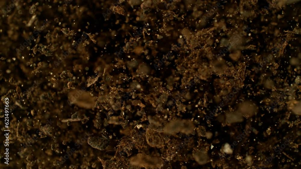 Poster Super Slow Motion of Exploding and Rotating Earth in the Air. Filmed on High Speed Cinema Camera , 1000fps. Speed Ramp Effect.