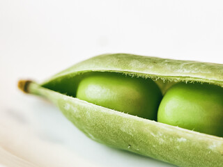 Harvest organic vegetables green peas.