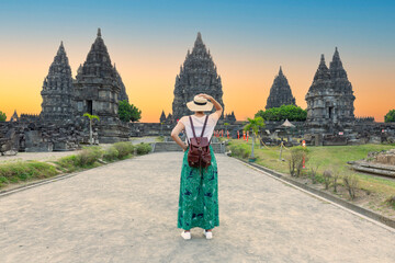 Woman traveler at Prambanan temple near Yogyakarta city, Central Java, Indonesia