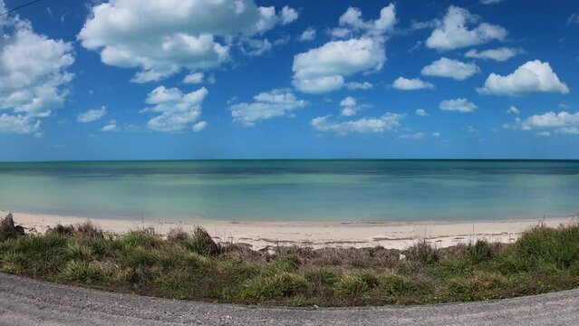 POV right side of driving car along coast Gulf of Mexico, Merida - Campeche road, Yucatan peninsula