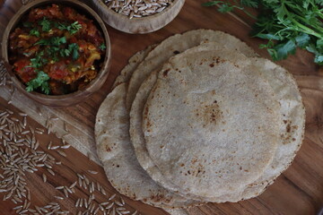 Khapli wheat roti served with baingan bharta.
