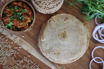 Khapli wheat roti served with baingan bharta.