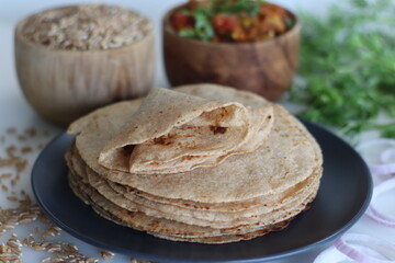 Khapli wheat roti served with baingan bharta.