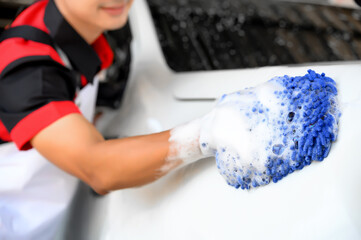Man Worker use Soap Washing and Taking Care of Vehicle car body with Diligence, Car Washing and...
