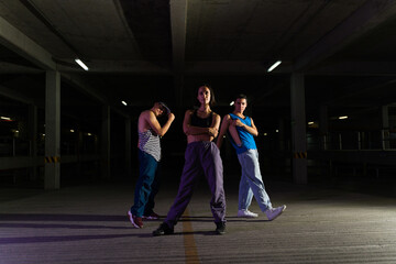 Funky group of street performers on stage at night