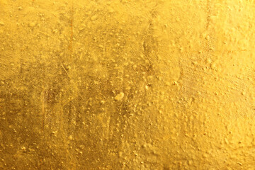 Shiny yellow leaf gold foil texture background