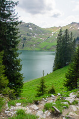 Beautiful swiss alpine landscape with a mountain lake.