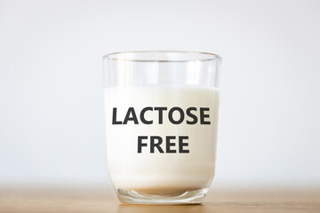A glass of milk with the inscription lactose free, close up, Healthy food