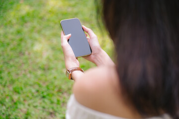 A female enjoying with smartphone