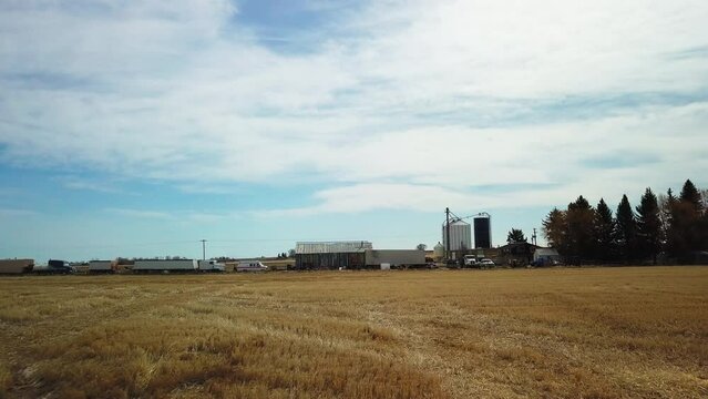 Aerial Forward Shot Of Silos And Industry Against Sky On Sunny Day - Billings, Montana