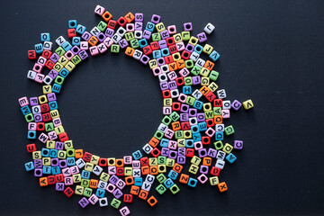 Colorful cubes on the black background form a circular shape