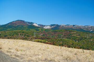 Drone photo mountain landscape with small towns in the seaside area