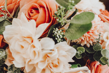 A romantic pink and white bouquet of roses for wedding inspiration or other special occasion where a peony floral display might be needed. 