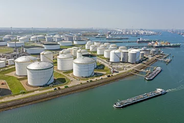 Rolgordijnen Aerial from industry in Rotterdam harbor in the Netherlands © Nataraj