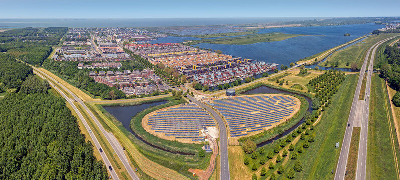 Aerial panorama from a solar Panel Farm with unique design in a form of an island at Almere Netherlands