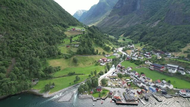 Aerial video of Viking Valley in Norway and a small town in the background