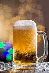 Mug with beer and white foam