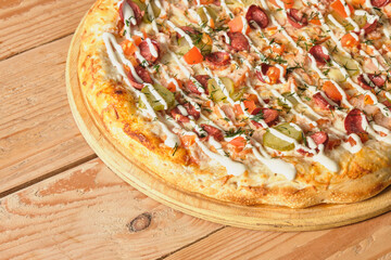 tasty piza on wooden table copy space