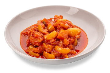 Pepper stew with potatoes in tomato sauce in white dish isolated