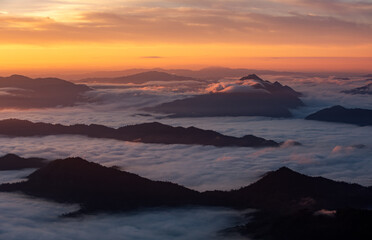 Aerial top view High mountain in morning time. Beautiful natural landscape Beautiful Sunrise Natural view on the hill, sea fog
