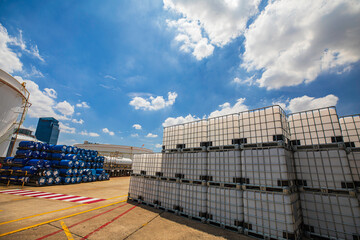 The stock of plastic barrels for the chemical industry. white plastic containers. Chemical...