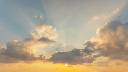 abstract background of cloudy sunset sky golden hour