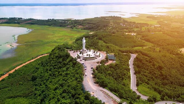 Aerial view of Our lady of Lourdes Virgin Mary catholic religious statue on a Nui Cui mountain in Dong Nai province, Vietnam.