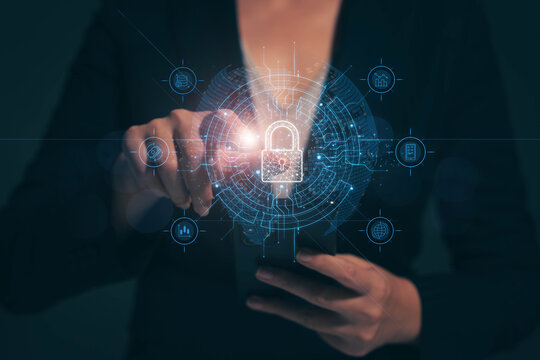 Cyber ​​Security and Protection of Critical Data Businesswoman holding a padlock, internet network security Protect your business and financial transaction data from cyber attacks. 