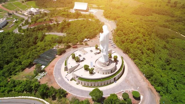 Aerial view of Our lady of Lourdes Virgin Mary catholic religious statue on a Nui Cui mountain in Dong Nai province, Vietnam.