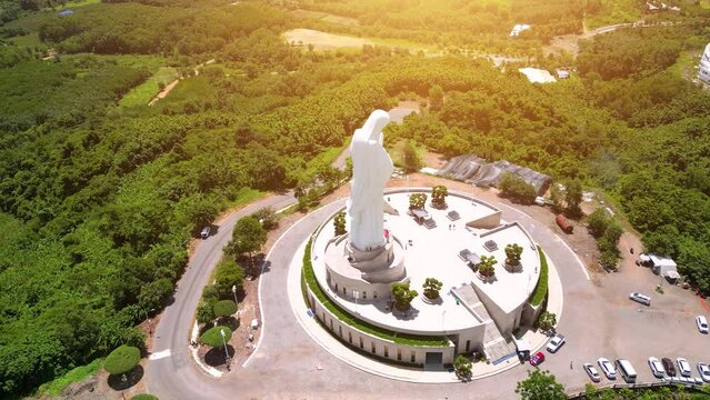 Aerial view of Our lady of Lourdes Virgin Mary catholic religious statue on a Nui Cui mountain in Dong Nai province, Vietnam.