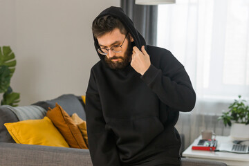 Obraz premium Sad man pondering about his life after a relationship breakup or bipolar disorder - depression asthenia , mental problem and anxiety disorder concept