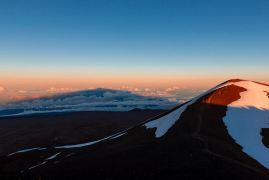 Shadow of Mauna Kea volcano cast at sunset