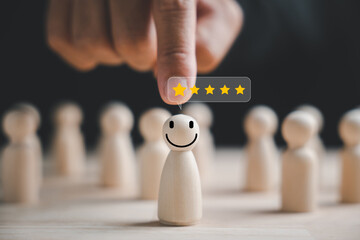 Selecting a happy face wooden figure for success. Customer service rating, feedback, and...