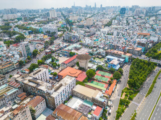 Aerial view of Ho Chi Minh City skyline and skyscrapers in center of heart business at Ho Chi Minh City downtown. Cityscape and many buildings, local houses