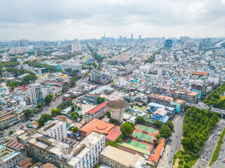 Aerial view of Ho Chi Minh City skyline and skyscrapers in center of heart business at Ho Chi Minh City downtown. Cityscape and many buildings, local houses
