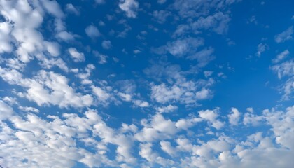 Fototapeta premium Whimsical Cloudscape: Tranquil Cirrocumulus Clouds Floating in a Sunny Sky, generative AI