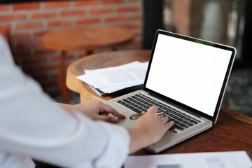 Woman with blank white screen laptop, Mockup image blank white desktop screen.