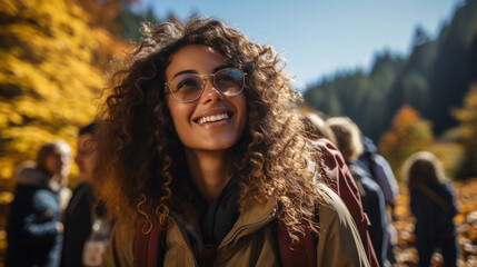 portrait of a african american woman hiking with friends