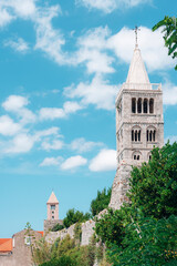 Bell tower of St. Mary's church, old town of Rab on the island Rab, Croatia. Copy space