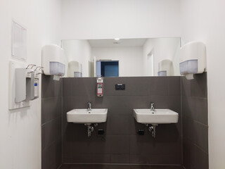 Industrial facility in a modern facility, toilet, shower cubicles and conveyor belt