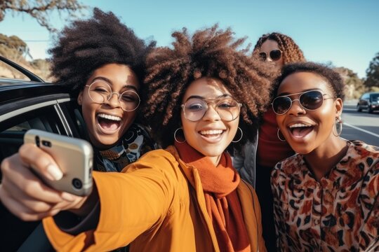 Happy black woman taking selfie near car, They make a photo session, take pictures of themselves on a smartphone, have fun.