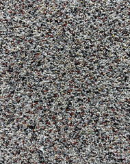 Texture of pebbles, small stone. Scuffs, vintage, retro.